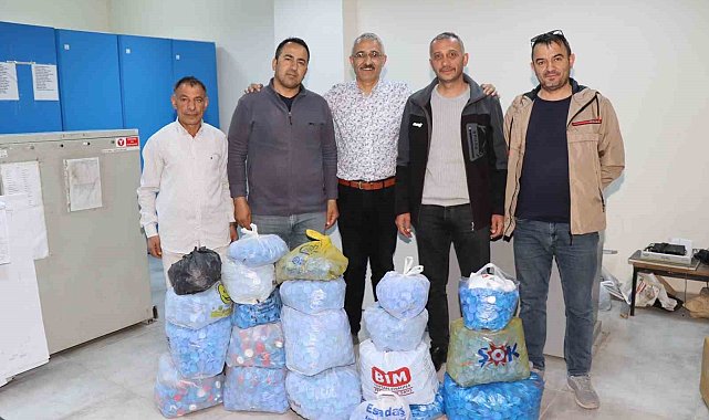 Oltu Kadastro personeli binlerce mavi kapak topladı