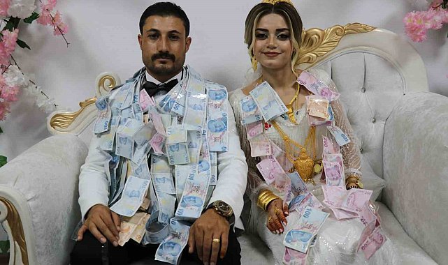 5 bin kişinin katıldığı düğünde gelin ve damada takılan takı dudak uçuklattı