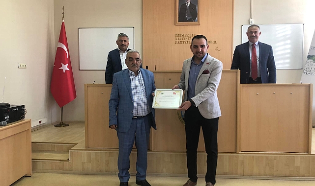 Digor Kaymakamı Karakaş'a  "Fahri Hemşehrilik Beratı" verildi