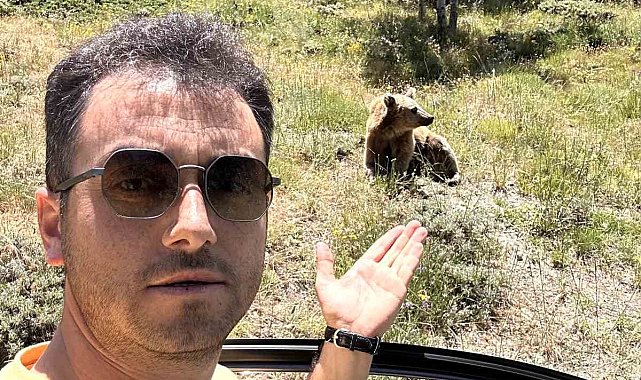 Eliyle beslemek istediği ayının saldırısına uğradı