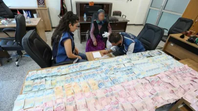 Dilencinin üzerinden 75 bin 950 TL çıktı