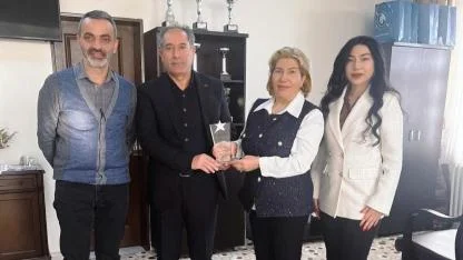 Çağatay, Kutbettin Yıldırım'a teşekkür plaketi sundu