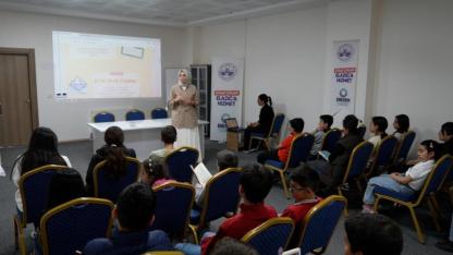 Kitap okuma atölyesi, aileler ve çocukları bir araya getirdi